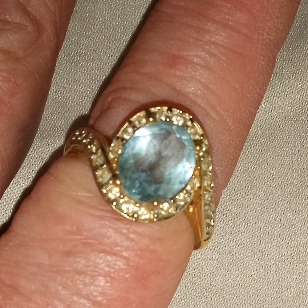 Gold Ring With Blue Gemstone - image 1